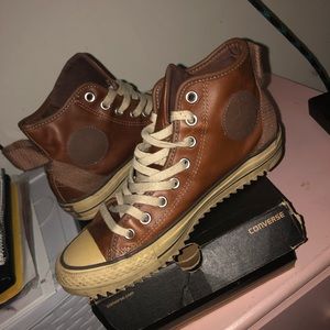 Brown leather Chuck Taylor high-tops